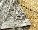 Detail mouw naam hond