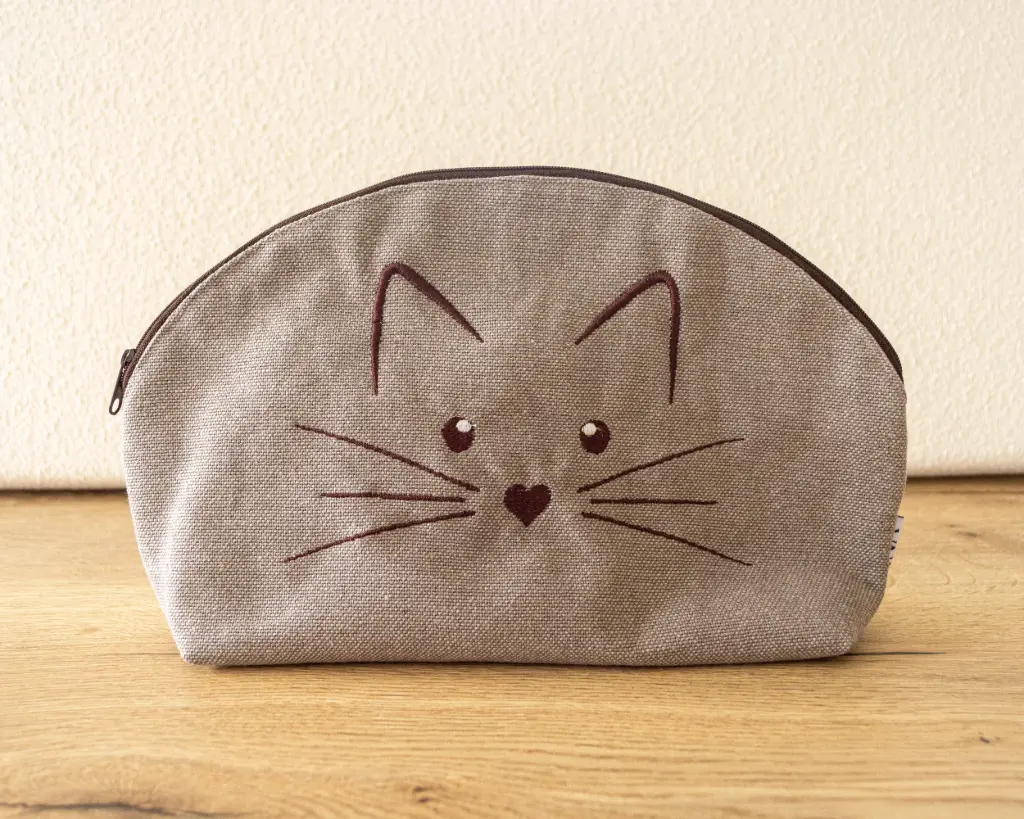 Toilettas kat donker beige