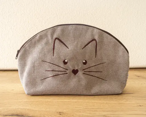 Toilettas kat donker beige